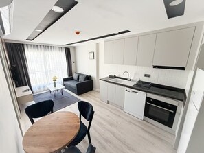 Appartement Supérieur, cuisine | Coin séjour