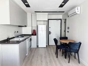 Căn hộ Superior, bếp | Bếp riêng | Tủ lạnh, lò nướng, bếp nấu, máy rửa bát 