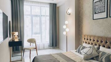 In-room safe, desk, laptop workspace, blackout curtains