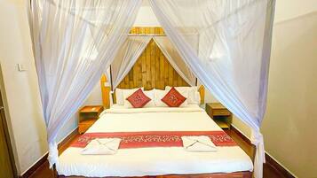 Deluxe Double Room, Pool View | Desk, laptop workspace, free WiFi