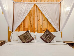 Deluxe Double Room, Pool View | Desk, laptop workspace, free WiFi