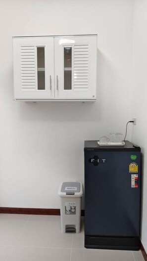 Fridge, cleaning supplies, paper towels