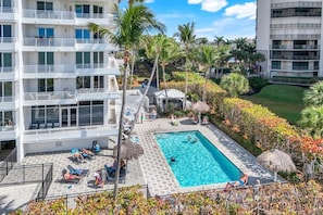 A heated pool - Beachfront 2BR/2BA Somerset condo with pool, WiFi, and heated pool. (Marco Island)