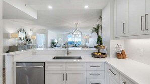 Private kitchen - Beachfront 2BR/2BA Somerset condo with pool, WiFi, and heated pool. (Marco Island)