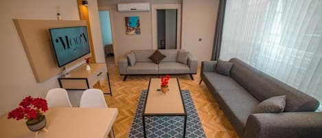 Superior Apartment, 2 Bedrooms | Living area | 43-inch Smart TV with satellite channels, Netflix, streaming services