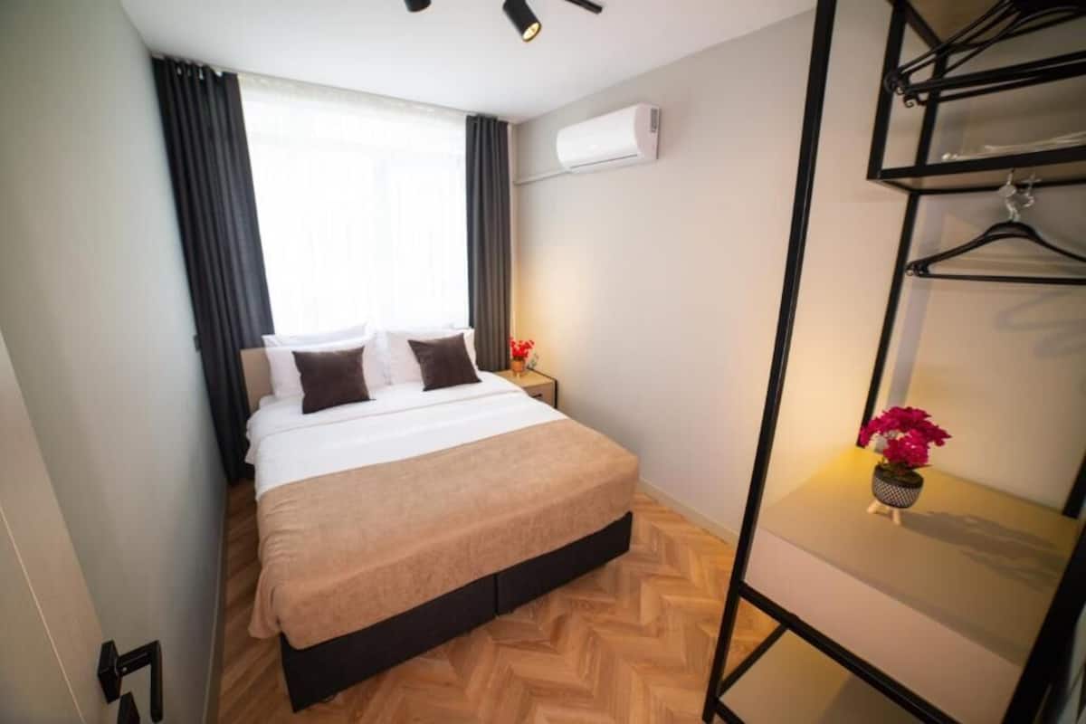 Superior Apartment, 2 Bedrooms | Premium bedding, desk, laptop workspace, blackout drapes