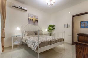 In-room safe, desk, iron/ironing board, travel cot - Elegant 2BR Family Oasis with Lush Private Garden (Amman)
