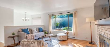 TV, fireplace, books, offices