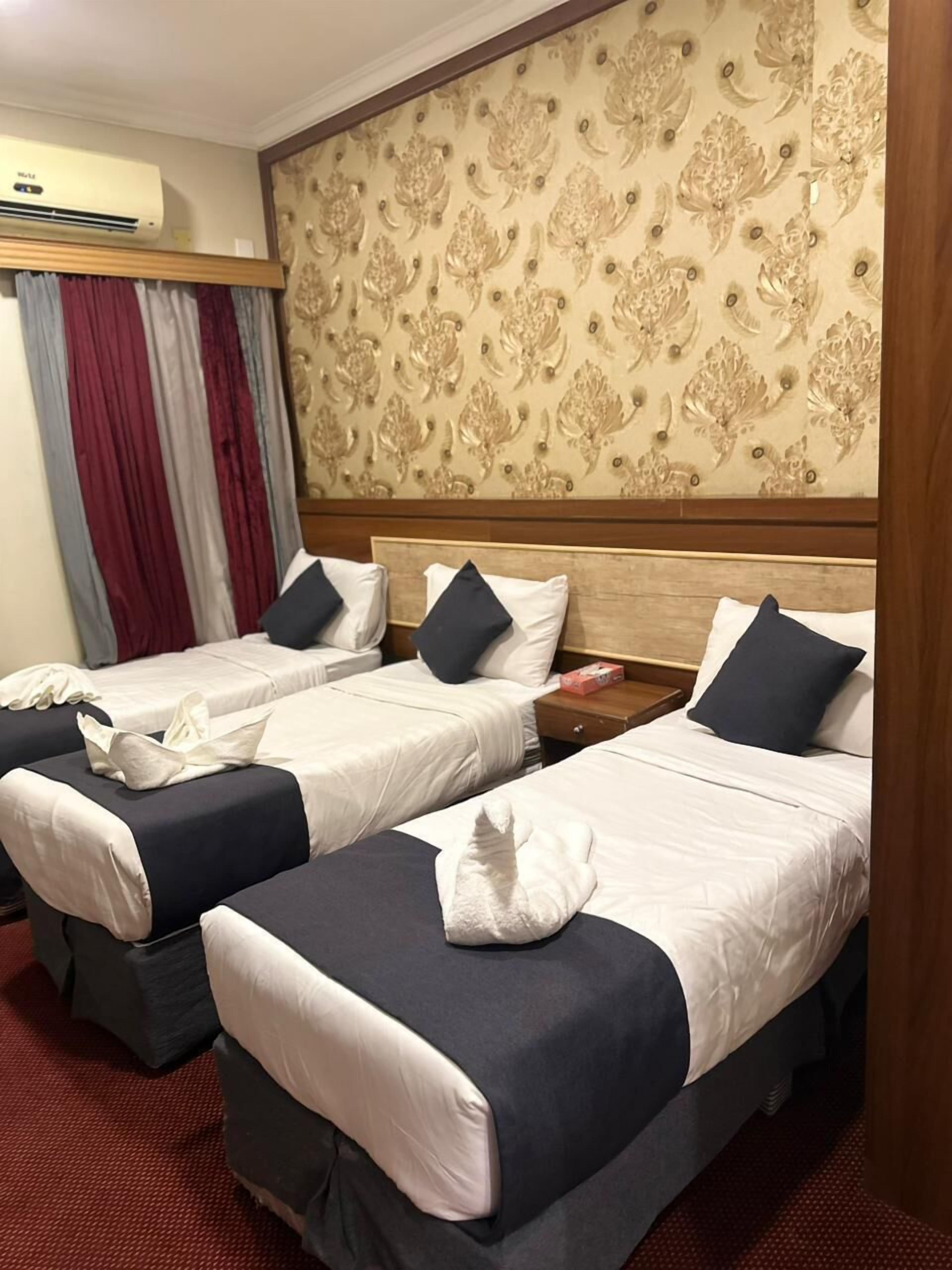 Eenpersoonskamer | Luxe beddengoed, verduisterende gordijnen, geluiddichte muren