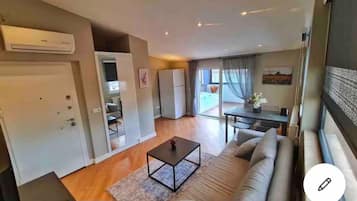 Deluxe-Penthouse, 1 Schlafzimmer, Whirlpool | Wohnbereich