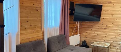 Family Cabin, Ocean View | Living area | 40-inch flat-screen TV with digital channels