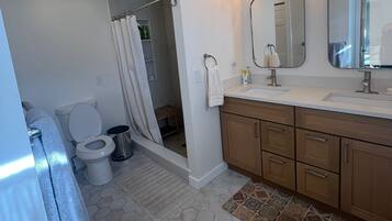 Shower, hair dryer, towels, soap