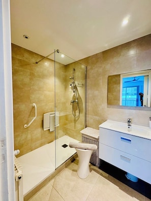 Shower, hair dryer, towels, soap