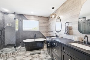 Shower, hair dryer, towels, shampoo