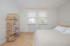 1 bedroom, desk, iron/ironing board, travel crib