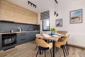Fridge, microwave, oven, stovetop - Comfortable Apartment with Balcony | 2 Bedrooms | Parking. (Katowice)