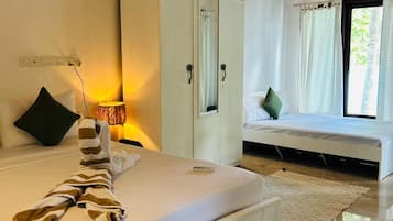 Quadruple Room, Garden View | Free WiFi, bed sheets