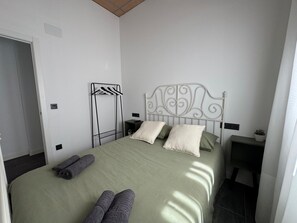 2 habitaciones, tabla de planchar con plancha, wifi y ropa de cama 
