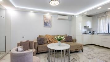 Departamento, 1 habitación | Área de sala de estar