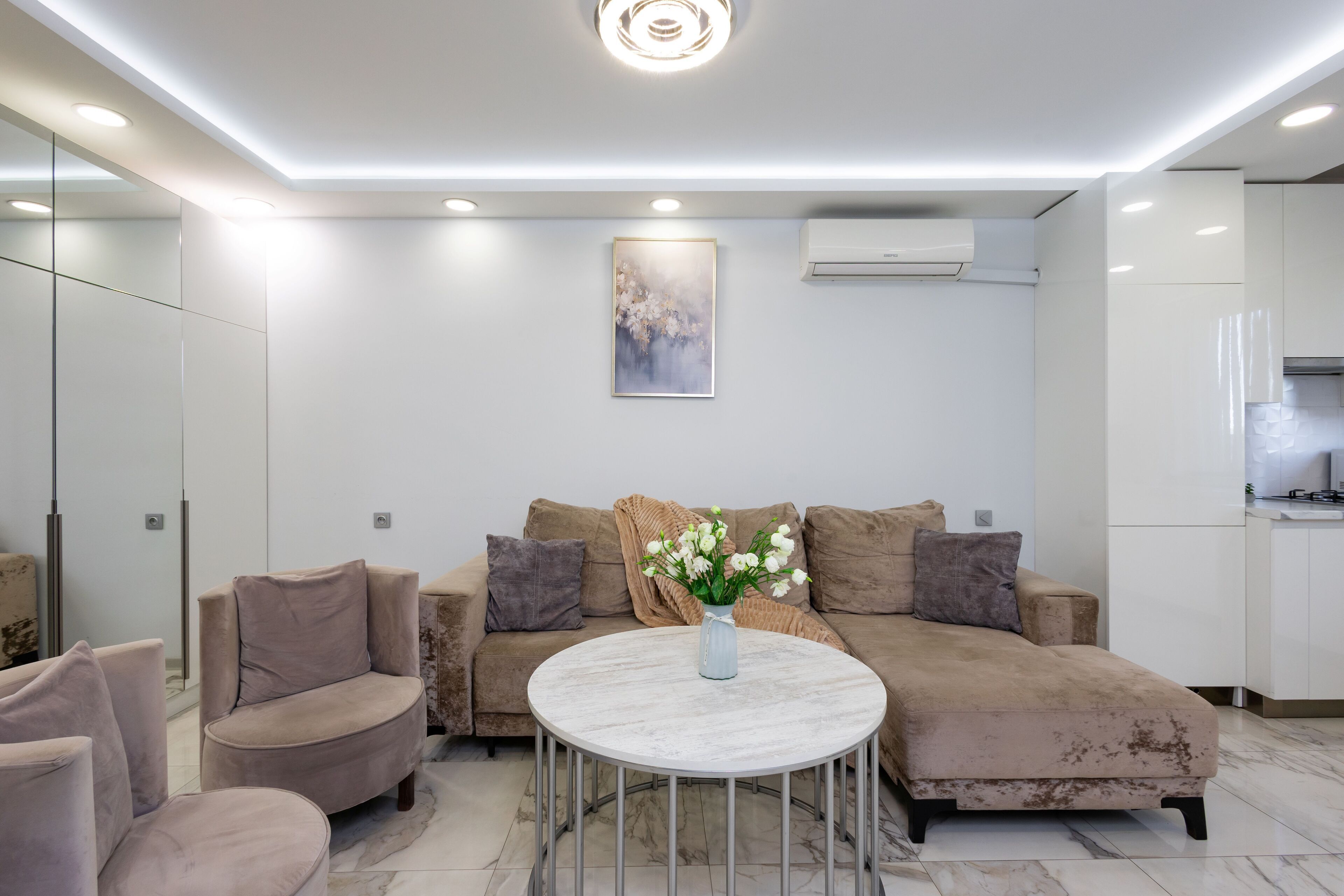 Apartment, 1 Bedroom | Living area | 50-inch flat-screen TV with cable channels
