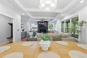Smart TV, fireplace, books, offices