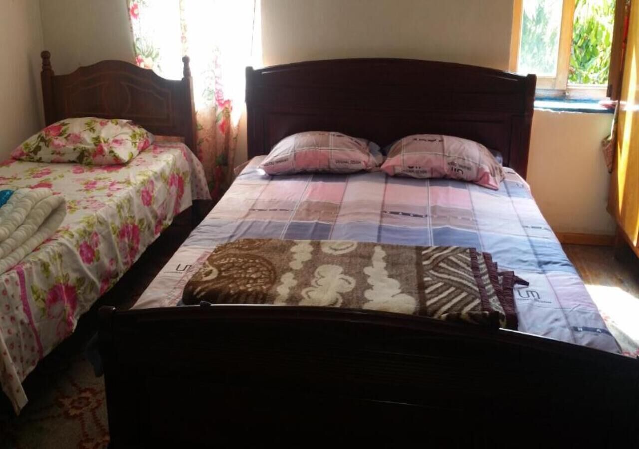 2 habitaciones, tabla de planchar con plancha y internet 