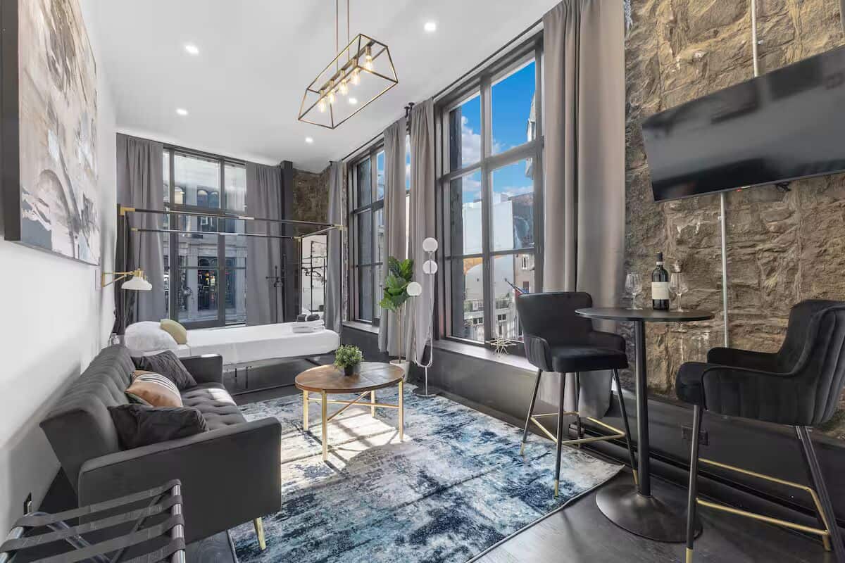 Studiosuite – deluxe, byutsikt | Oppholdsområde