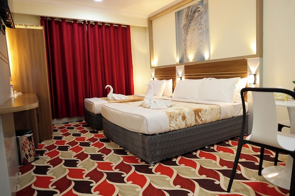 Family Room, City View | Desk, laptop workspace, soundproofing, iron/ironing board