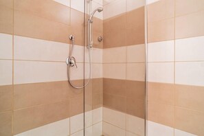 Shower, hair dryer, shampoo
