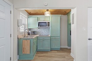 Fridge, microwave, coffee/tea maker, toaster