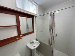 Shower, towels, soap, toilet paper