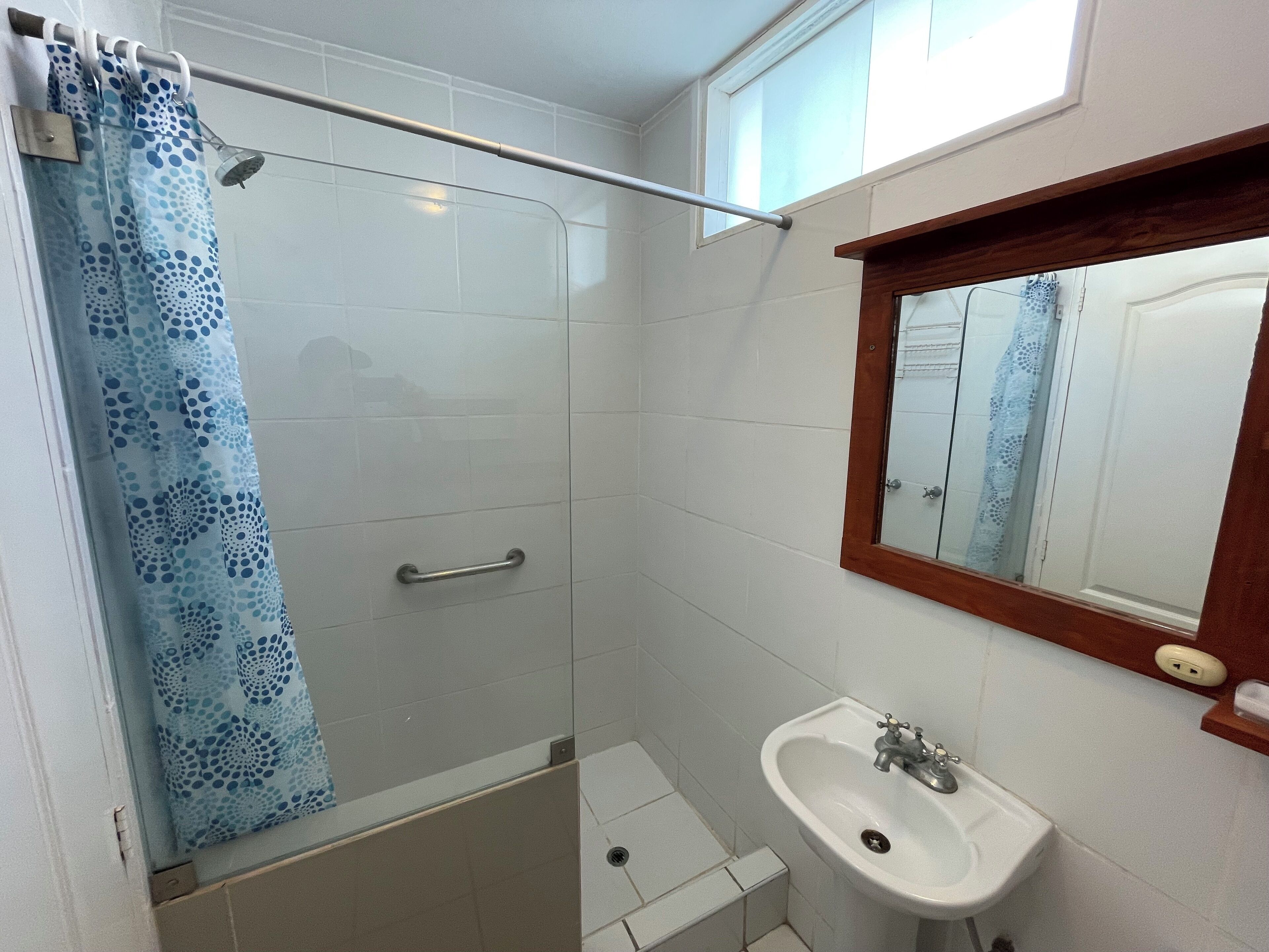 Shower, towels, soap, toilet paper