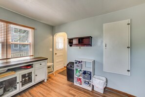 A compact kitchen with a wooden countertop, a white cabinet, and a window with blinds. - Gary Hunting & Fishing Base w/ Wraparound Deck (Gary)