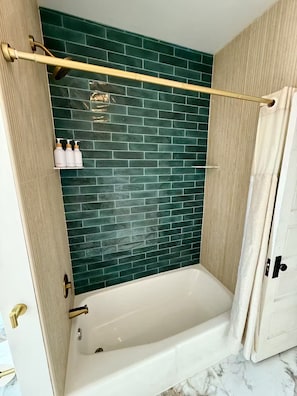 Shower, hair dryer, towels, soap