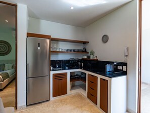 Fridge, microwave, stovetop, coffee/tea maker