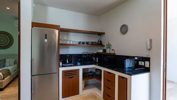 Fridge, microwave, stovetop, coffee/tea maker