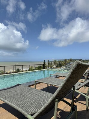 Apartment | Pool | Outdoor pool, pool umbrellas, sun loungers
