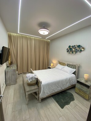 1 habitación, tabla de planchar con plancha, wifi y ropa de cama 