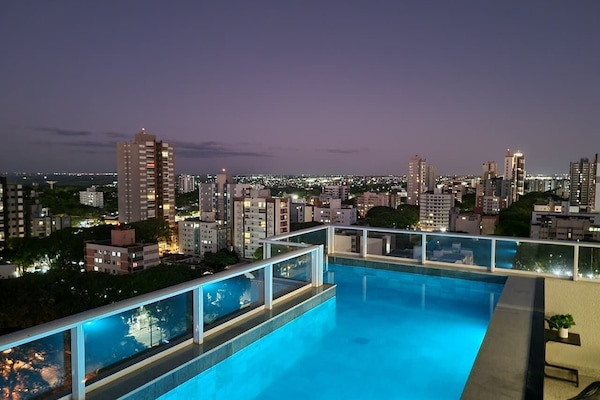Outdoor pool, open 7:00 AM to 10:00 PM, sun loungers