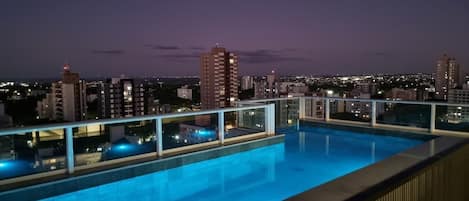 Outdoor pool, open 7:00 AM to 10:00 PM, sun loungers