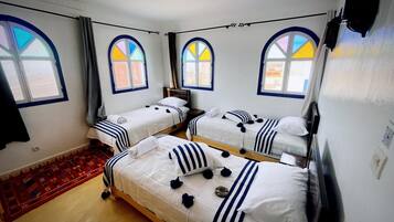 Habitación familiar, vista al océano | Wifi gratis