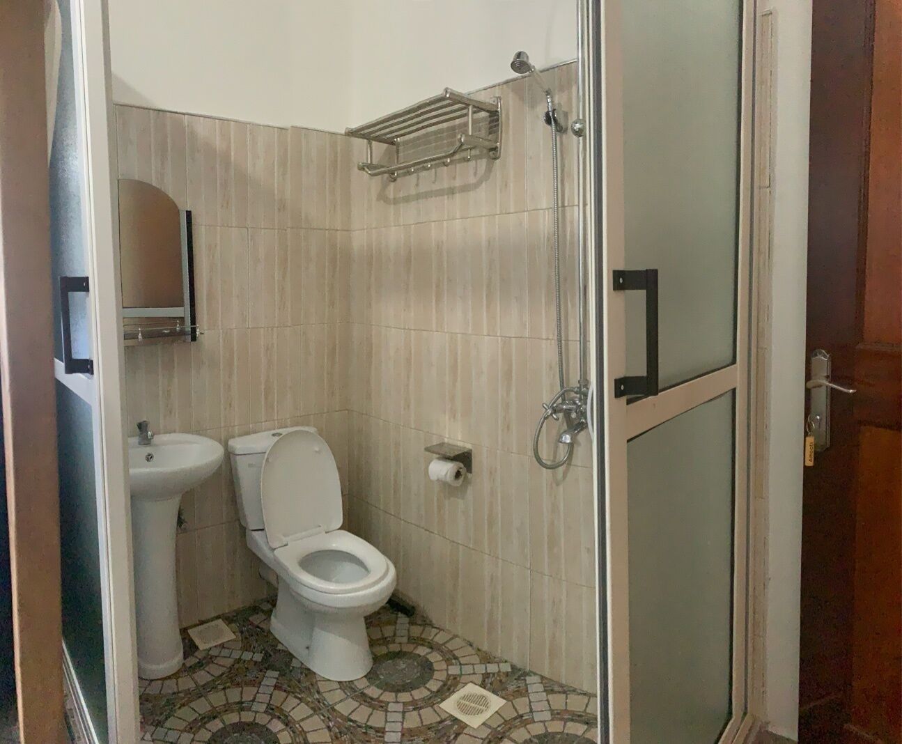 Shower, towels, soap, toilet paper