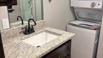 Shower, towels, toilet paper