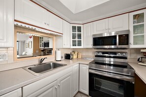 Coffee/tea maker, fridge, microwave, oven - 2-Bedroom Ocean Front Condo in 9400 Building (Ocean City)