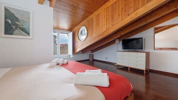 Couette en duvet d'oie, rideaux occultants, fer et planche Ă repasser