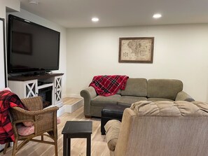 TV, DVD player, books, video library