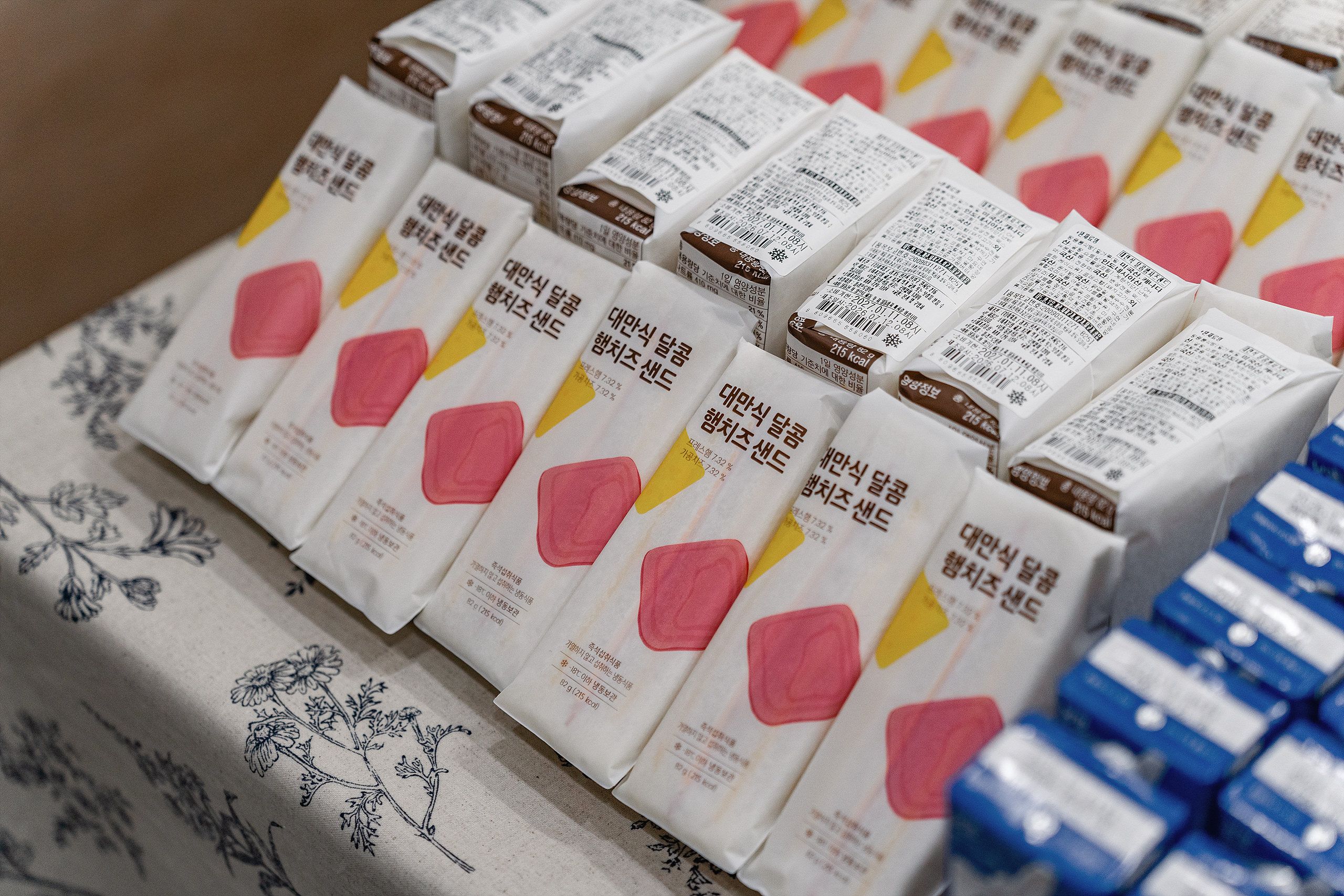 A display of packaged food items with labels and nutritional information.