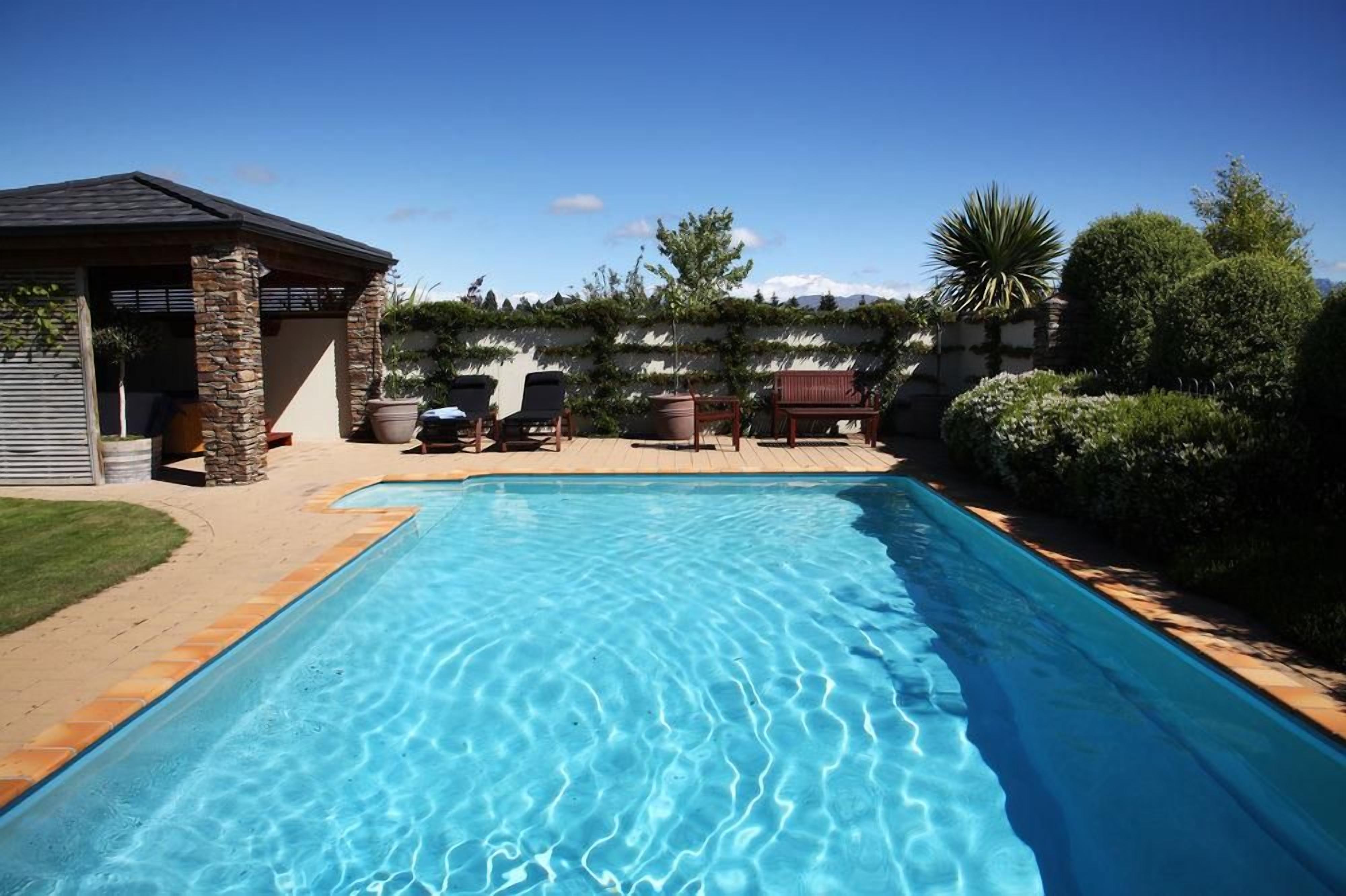 Seasonal outdoor pool, pool umbrellas