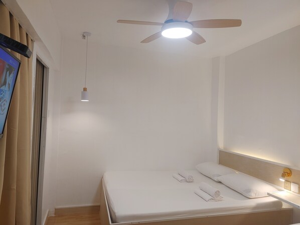 Deluxe Quadruple Room | Individually decorated, individually furnished, free WiFi, bed sheets