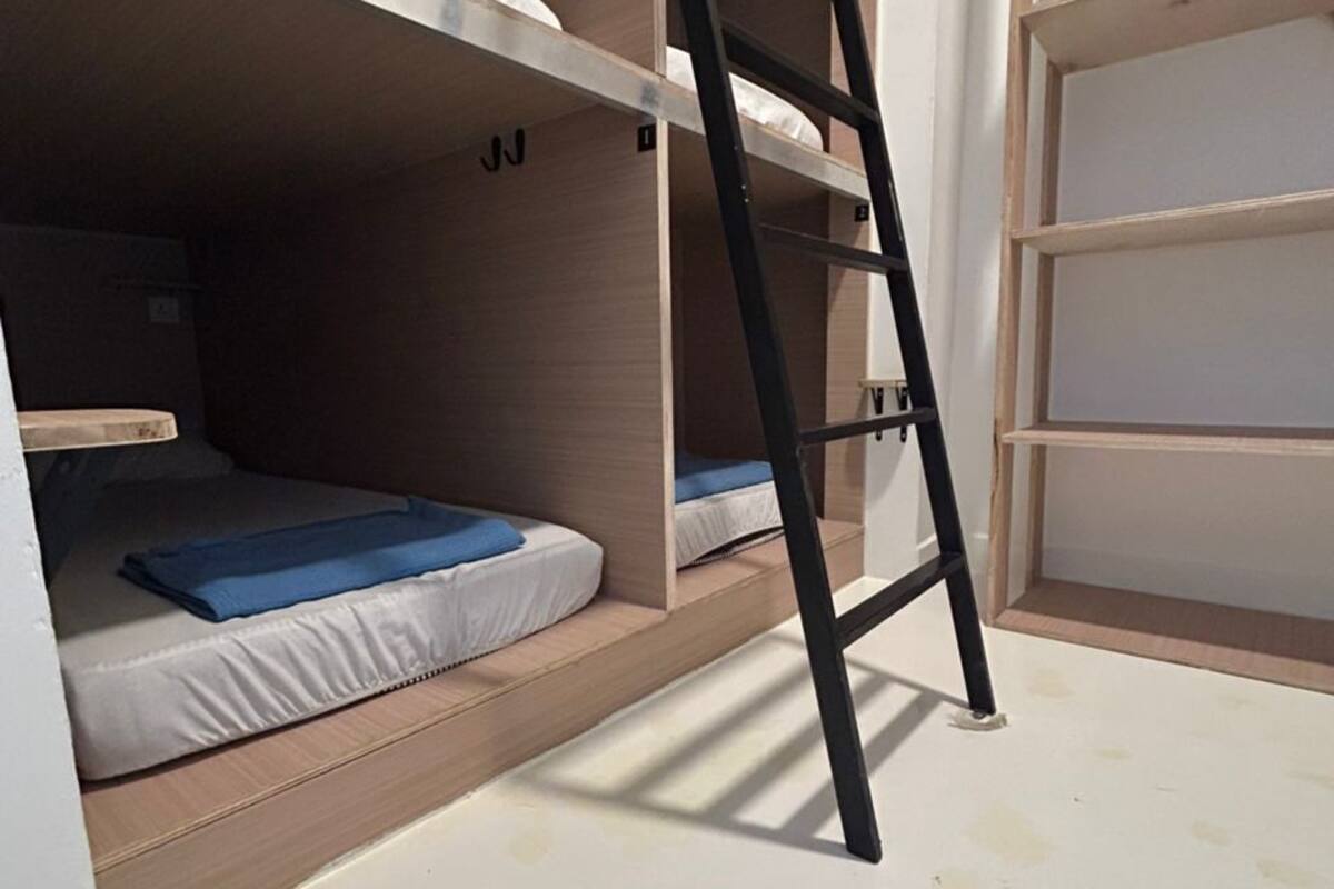 Laptop workspace, blackout curtains, soundproofing, iron/ironing board